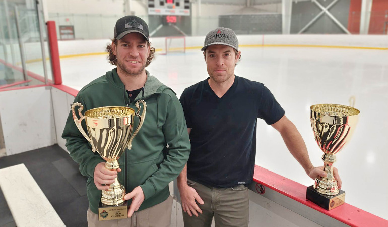 Grant Cooper, left, and Brock McBride of Own the Ice Hockey