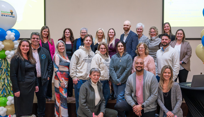 Group picture of finalists, judges, committee, mentors at tourism innovation challenge